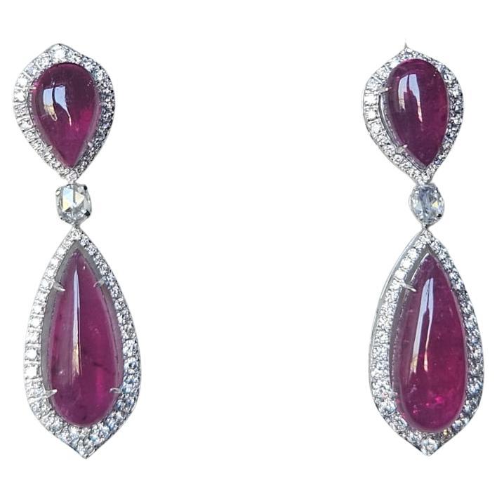 Set in 18K Gold, 12.16 carats Rubellite Cabs
Rose Cut Diamond Dangle Earrings