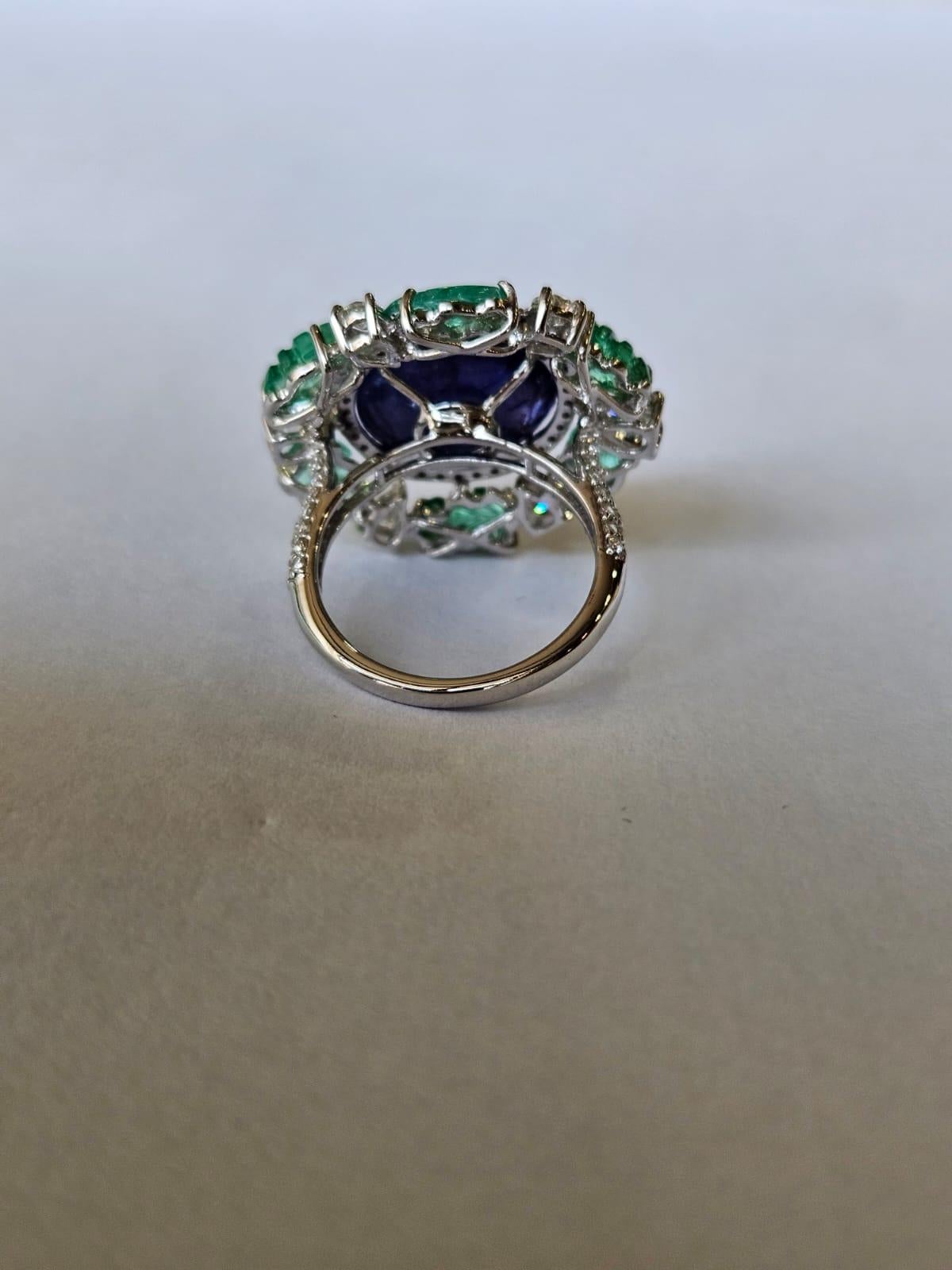 Art Deco Set in 18K Gold, 12.59 carat Tanzanite Cabochon, Emerald & Diamond Cocktail Ring For Sale