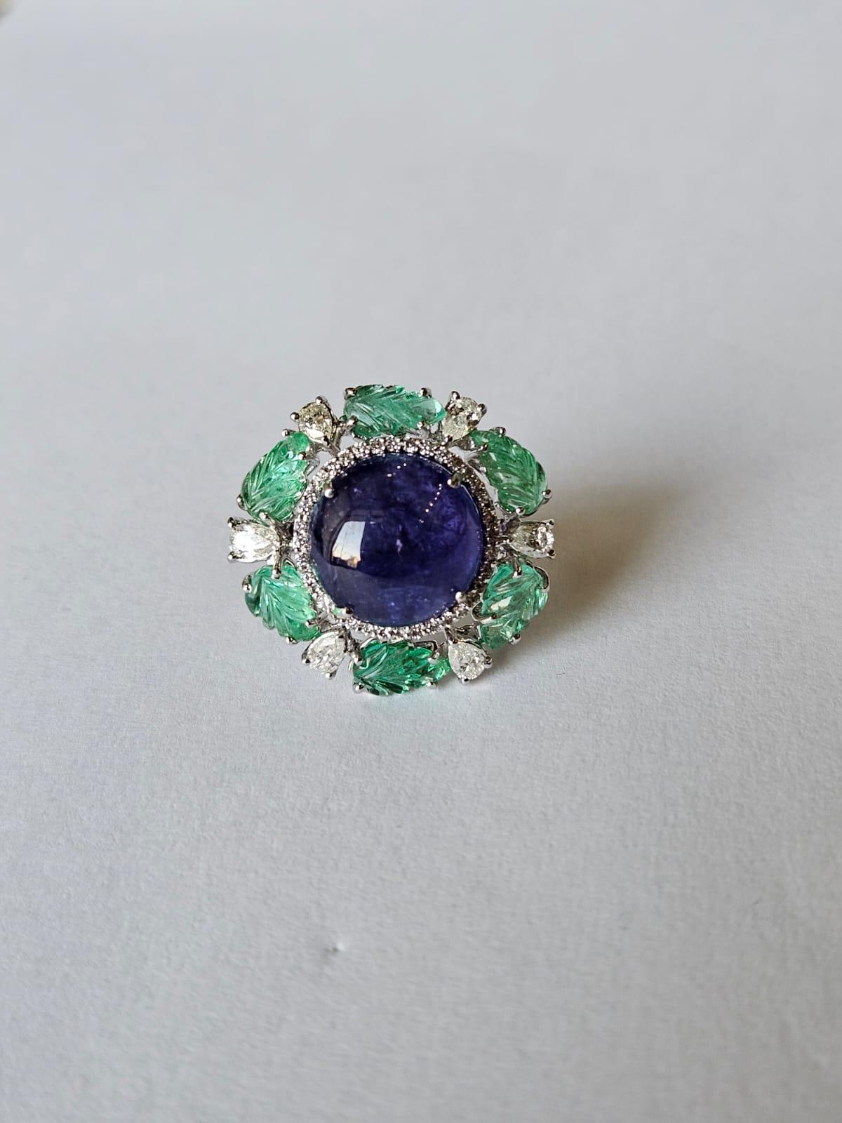 Set in 18K Gold, 12.59 carat Tanzanite Cabochon, Emerald & Diamond Cocktail Ring In New Condition For Sale In Hong Kong, HK