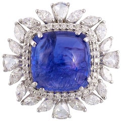 Set in 18K Gold, 12.61 Carat Tanzanite Cabochon, Fancy Diamonds Cocktail Ring