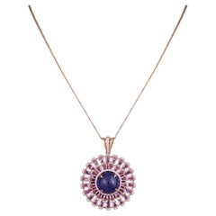 Set in 18K Gold, 13.10 carat Tanzanite, Pink Sapphire & Diamond Pendant Necklace