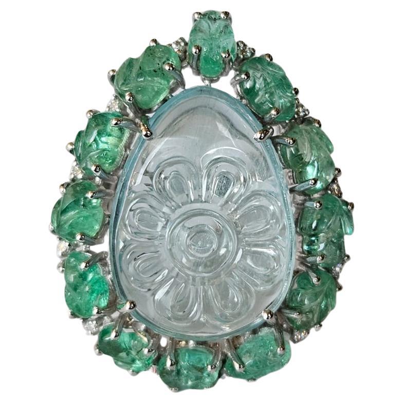 Set in 18K Gold, 13.39 carats carved Aquamarine, Emerald & Diamond Cocktail Ring
