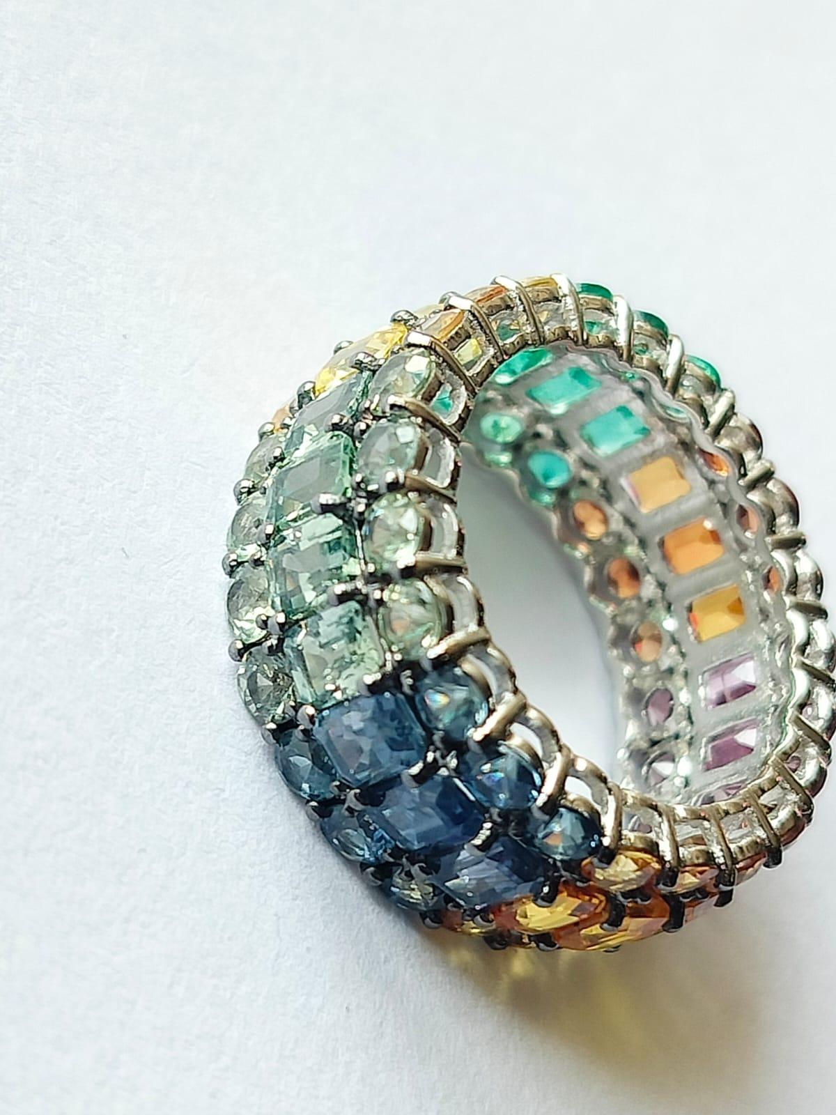 Modern Set in 18K Gold, 1.49 Carats Emerald & 9.59 carats Multi Sapphires Cocktail Ring For Sale