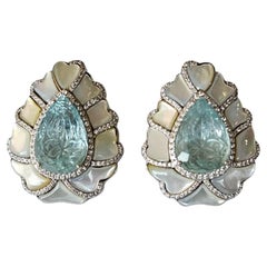 Set in 18K Gold, 15.32 carats, carved Aquamarines, Pearl & Diamonds Stud Earring