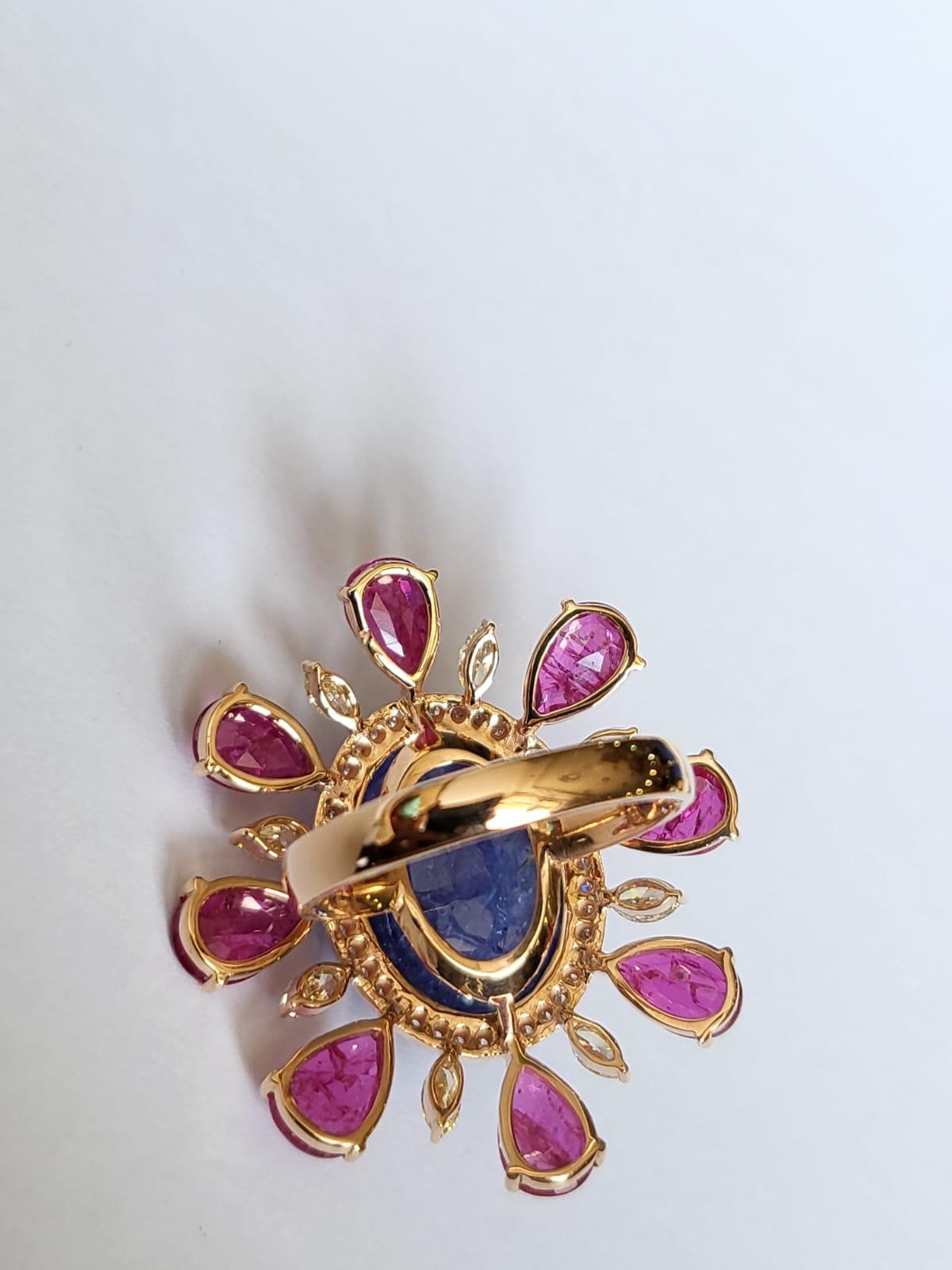 Modern Set in 18k Gold, 15.48 Carats Tanzanite, Natural Rubies & Diamonds Cocktail Ring For Sale