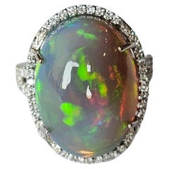 Set in 18K Gold, 16.23 carats Ethiopian Opal & Diamonds Cocktail Engagement Ring