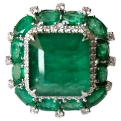 Set in 18K Gold, 16.60 carats natural Zambian Emerald & Diamonds Engagement Ring