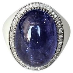 Set in 18K Gold, 17.39 carats, Tanzanite, White Enamel & Diamonds Cocktail Ring