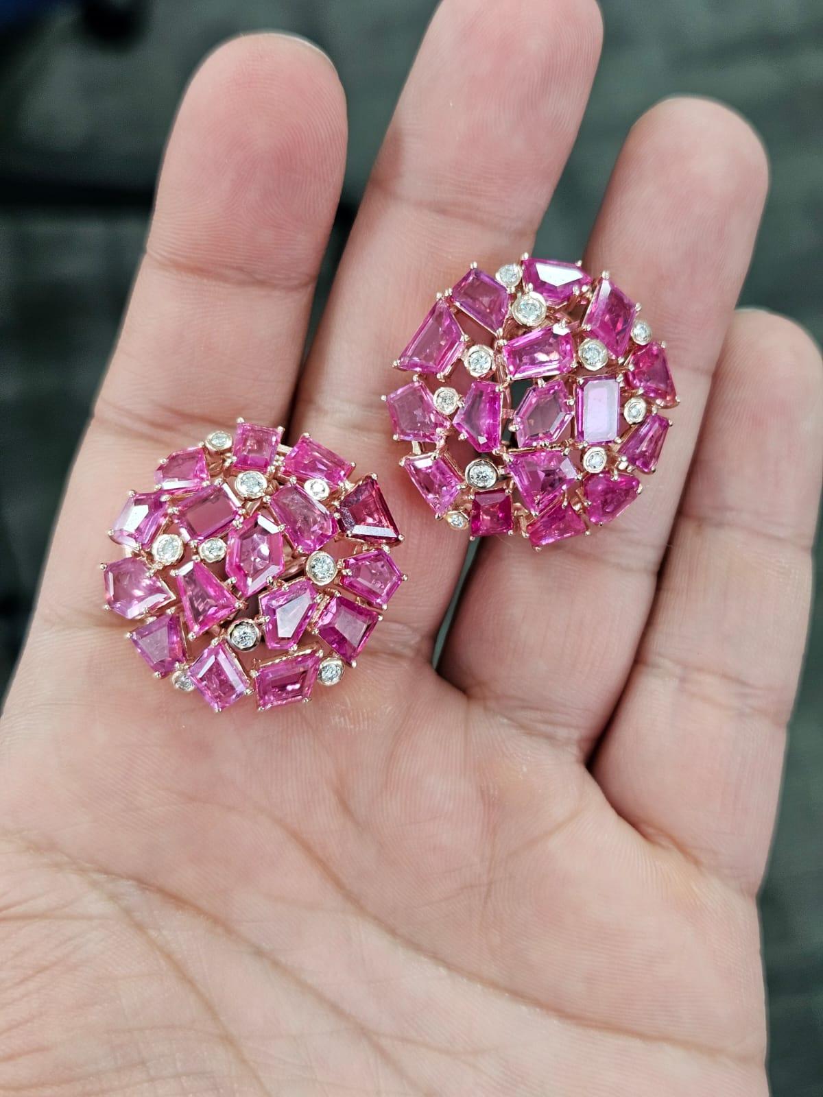 A very gorgeous and special, modern style, Ruby Stud Earrings set in 18K Rose Gold & Diamonds. The weight of the Rubies is 19.61 carats. The Rubies are completely natural, without any treatment and are of Mozambique origin. The Diamonds weight is
