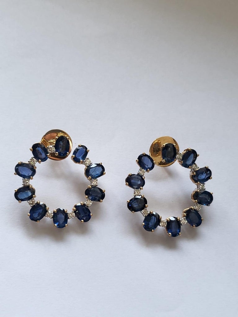 Set in 18K Gold, 18.75 Carats, Ceylon Blue Sapphires and Diamonds Hoop