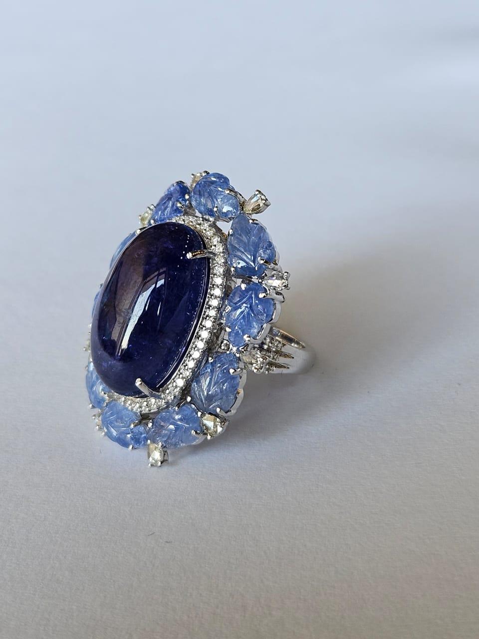 Cabochon Set in 18K Gold, 20.95 carats Tanzanite, Blue Sapphire & Diamonds Cocktail Ring For Sale