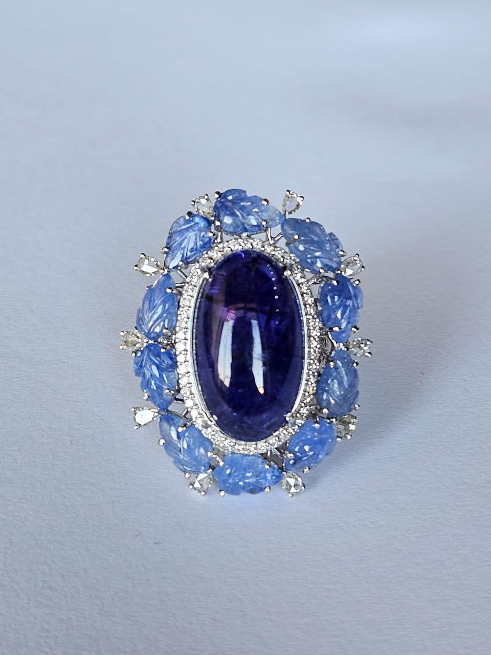 Set in 18K Gold, 20.95 carats Tanzanite, Blue Sapphire & Diamonds Cocktail Ring In New Condition For Sale In Hong Kong, HK