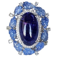Set in 18K Gold, 20.95 carats Tanzanite, Blue Sapphire & Diamonds Cocktail Ring