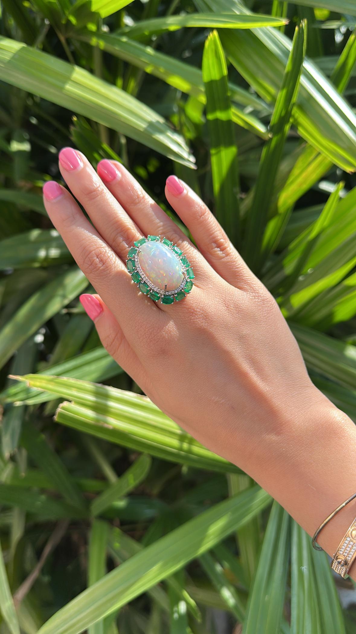 Set in 18K Gold, 21.06 carats Ethiopian Opal, Emeralds & Diamonds Cocktail Ring For Sale 4
