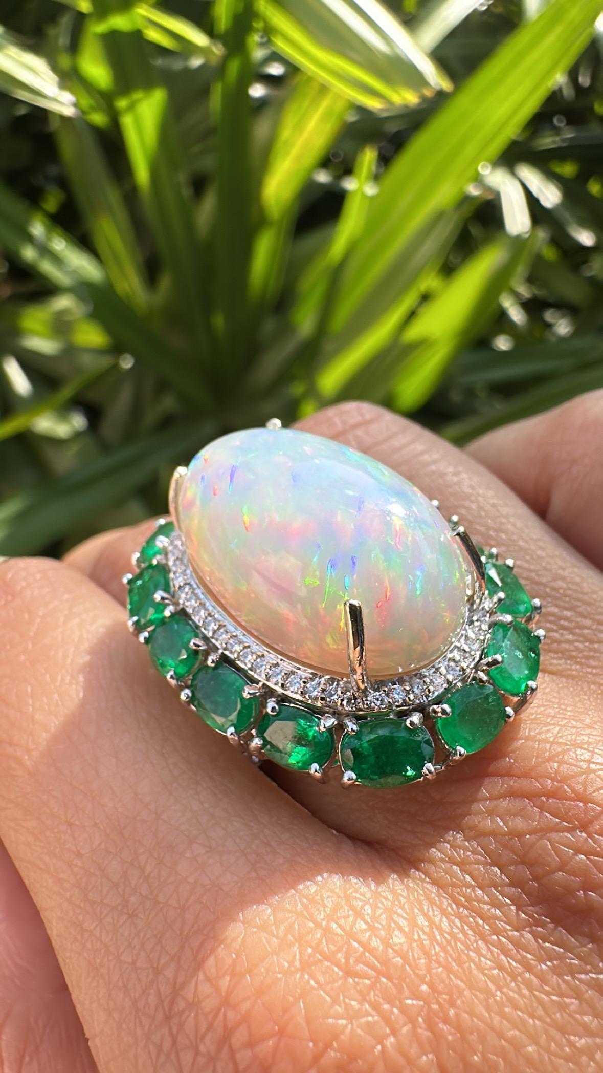 Set in 18K Gold, 21.06 carats Ethiopian Opal, Emeralds & Diamonds Cocktail Ring For Sale 1