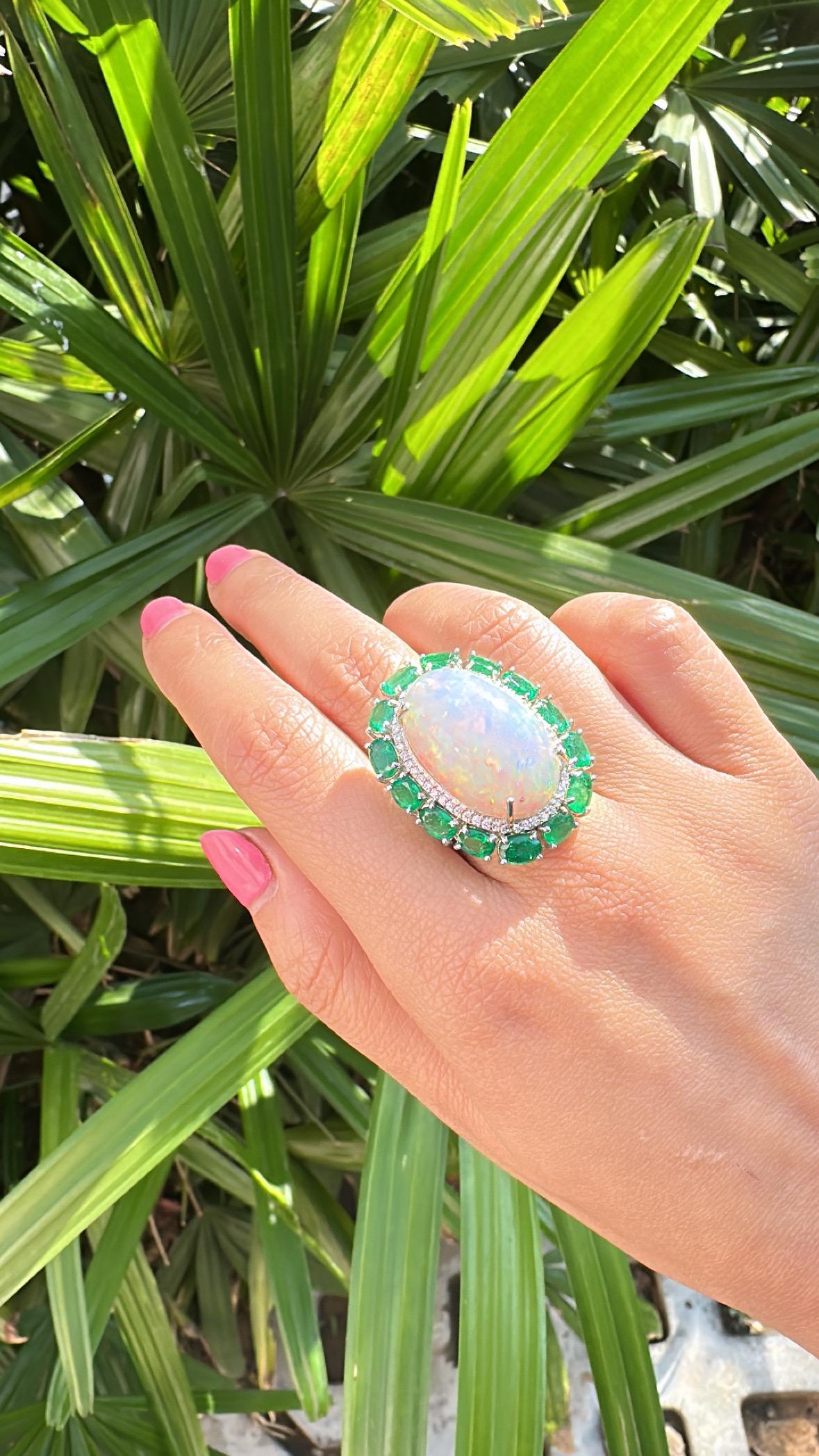 Set in 18K Gold, 21.06 carats Ethiopian Opal, Emeralds & Diamonds Cocktail Ring For Sale 3