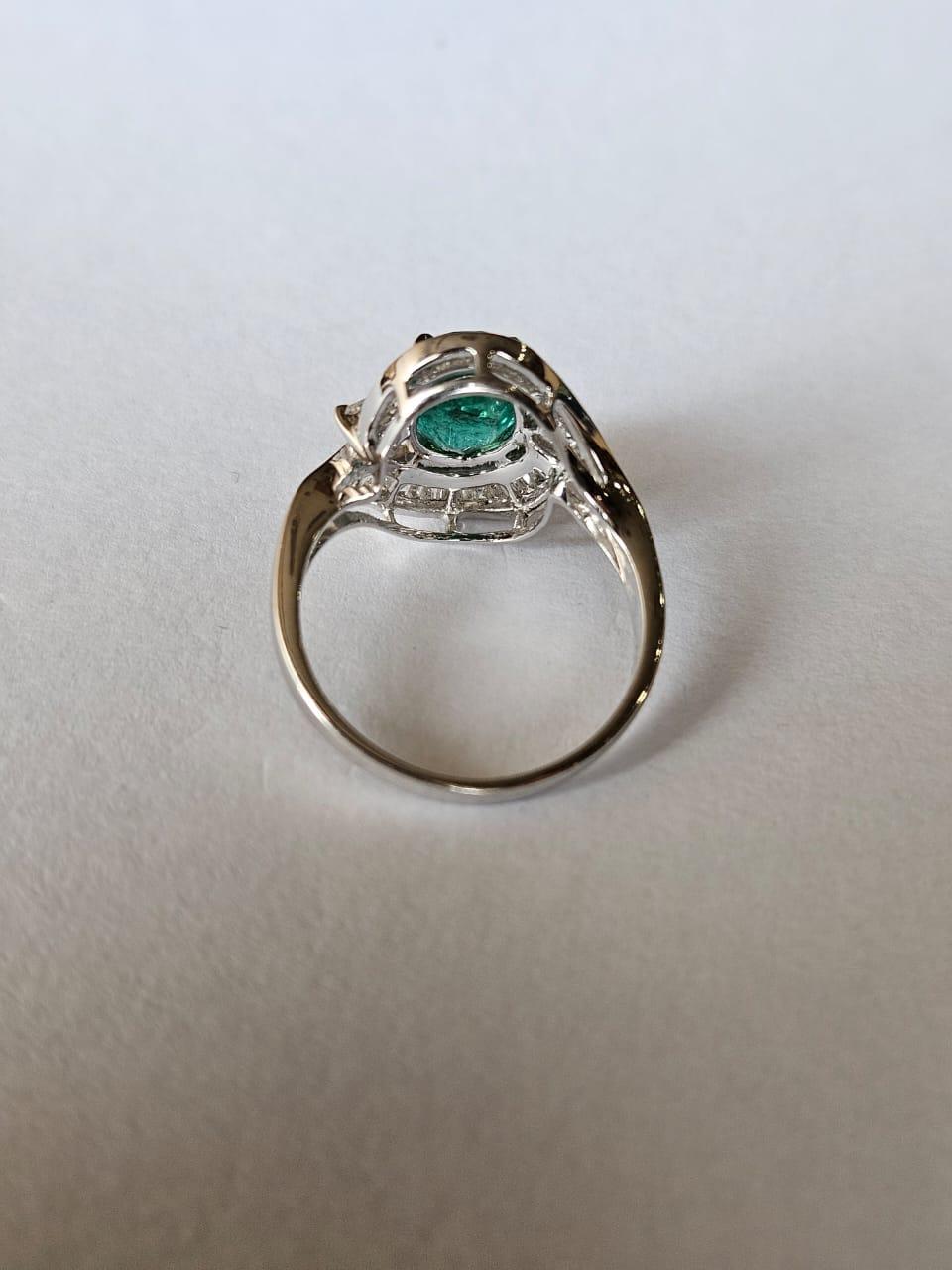 Tapered Baguette Set in 18K Gold, 2.14 carats natural Zambian Emerald & Diamonds Engagement Ring For Sale