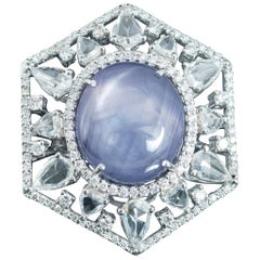 Set in 18K gold, 21.6ct Ceylon star sapphire and rose cut diamonds cocktail ring