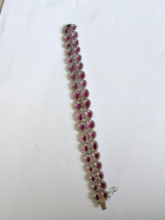 Set in 18K Gold, 22.17 carat, natural Mozambique Ruby & Diamonds Modern Bracelet