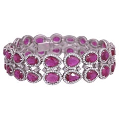 Set in 18K Gold, 22.17 carat, natural Mozambique Ruby & Diamonds Modern Bracelet