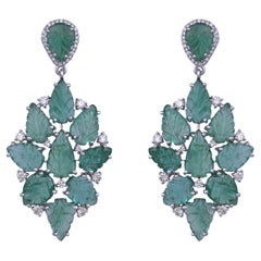 Set in 18K Gold, 22.98 carats, carved Zambian Emeralds & Diamonds Dangle Earring