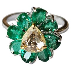 Set in 18K Gold, 2.42 carats, Emerald 
Yellow Rose Cut Diamond Engagement Ring