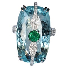 Set in 18K Gold, 24.23 carats Aquamarine, Emerald & Diamond Modern Cocktail Ring