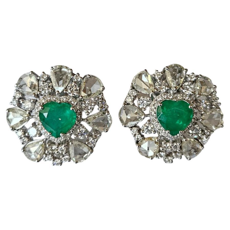 Set in 18K Gold, 2.67 carats, heart Emeralds & Rose Cut Diamonds stud Earrings
