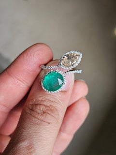 Set in 18K Gold, 2.72 carats, natural Zambian Emerald & Diamond Engagement Ring