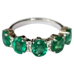 Set in 18K Gold, 2.73 carats, natural Zambian Emeralds & Diamonds Band Ring