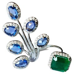Set in 18K Gold, 2.81 carats Emerald, Blue Sapphires & Diamonds Cocktail Ring
