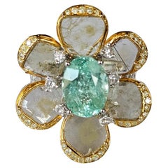 Set in 18K Gold, 2.84 carats, Paraiba Tourmaline 
Slice Diamonds Cocktail Ring