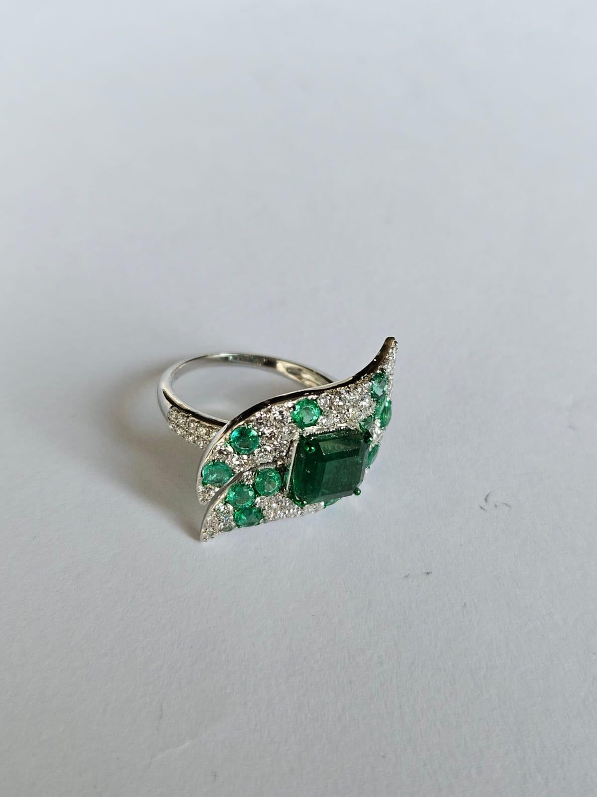 Emerald Cut Set in 18K Gold, 2.85 carats, natural Zambian Emerald & Diamonds Cocktail Ring For Sale