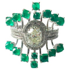 Used Set in 18K Gold, 3.03 carats Colombian Emeralds & Oval Diamond Engagement Ring