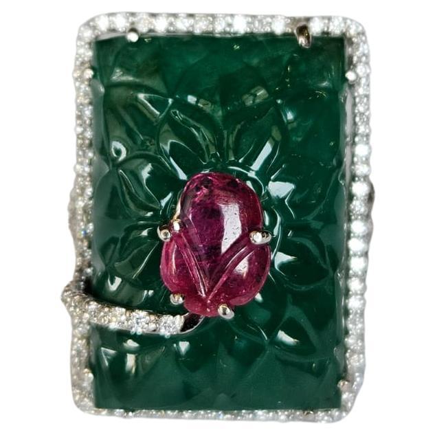 Set in 18K Gold, 31.23 carats Zambian Emerald, Ruby & Diamonds Cocktail Ring For Sale