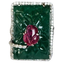 Set in 18K Gold, 31.23 carats Zambian Emerald, Ruby & Diamonds Cocktail Ring
