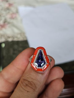 Set in 18K Gold, 3.29 carat, Tanzanite, Orange Enamel & Diamonds Engagement Ring