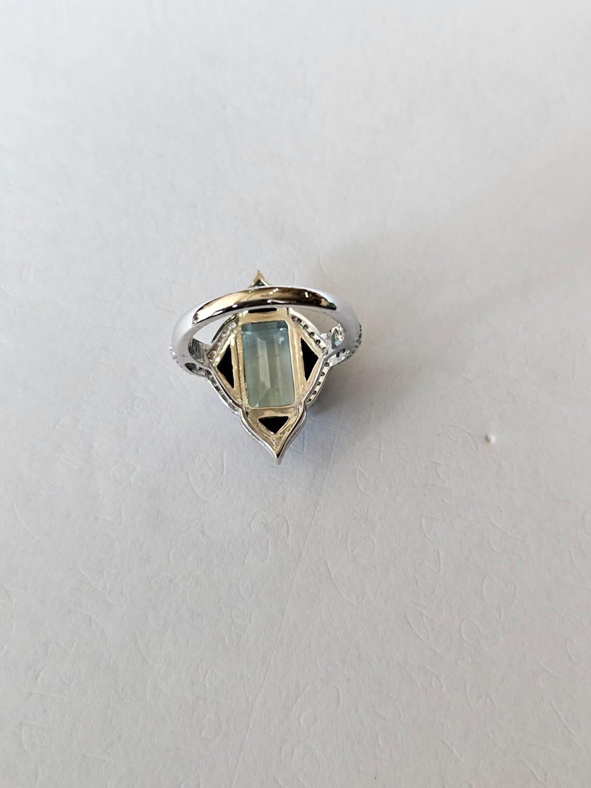 Art Deco Set in 18K Gold, 3.45 carats Aquamarine, Black Onyx & Diamonds Engagement Ring For Sale