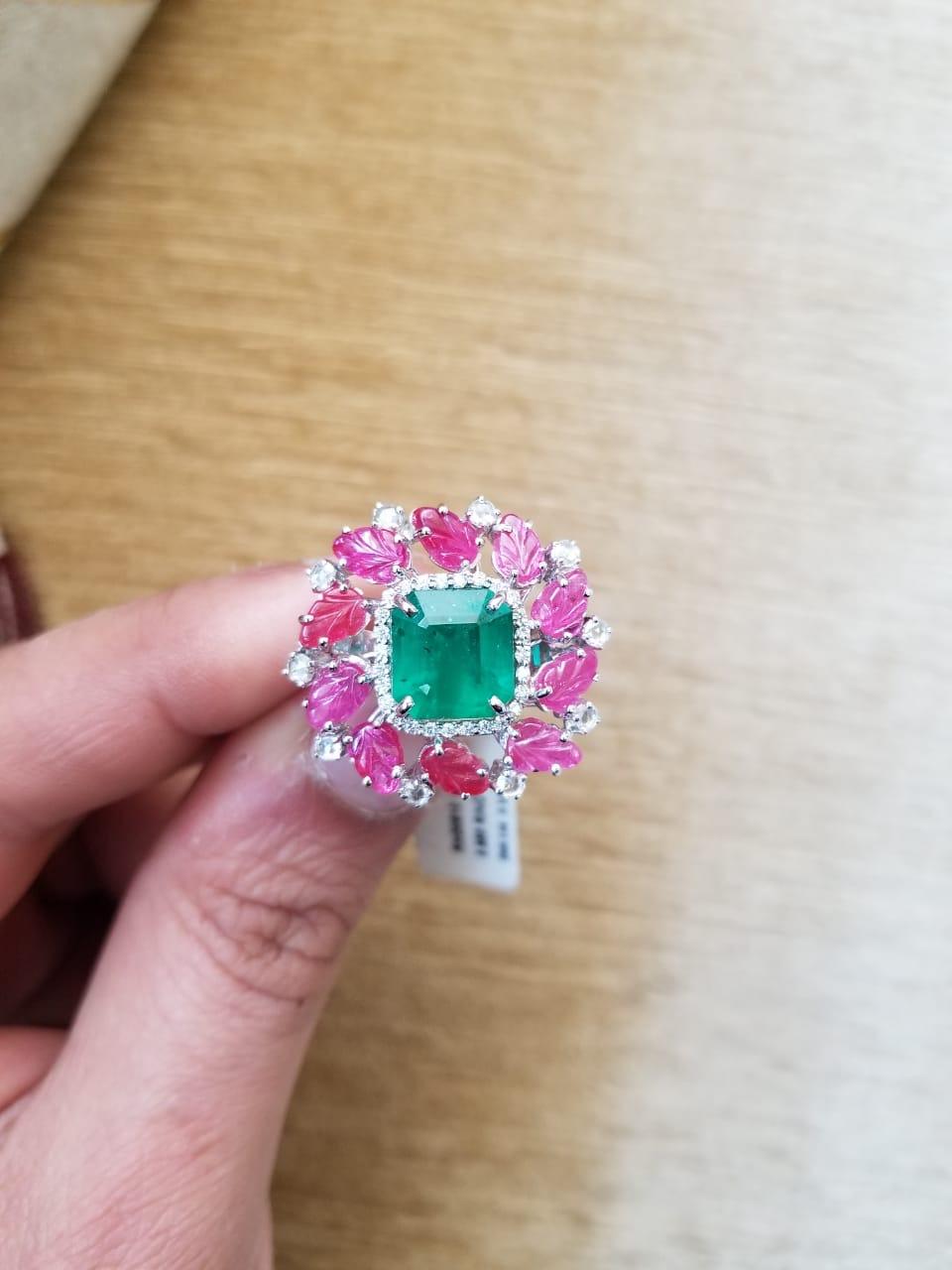 Modern 18 Karat Gold 3.66 Carat Zambian Emerald and Carved Ruby Cocktail Ring