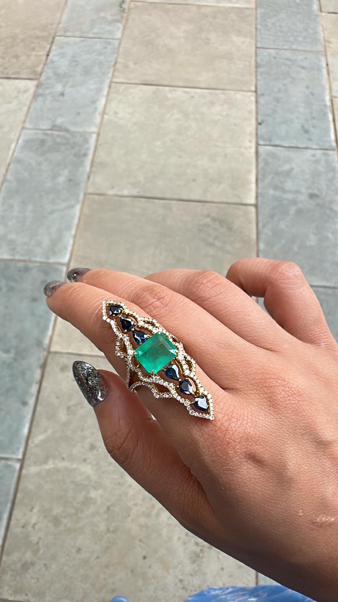Set in 18K Gold, 3.99 carats Emerald, Blue Sapphires & Diamonds Cocktail Ring For Sale 1
