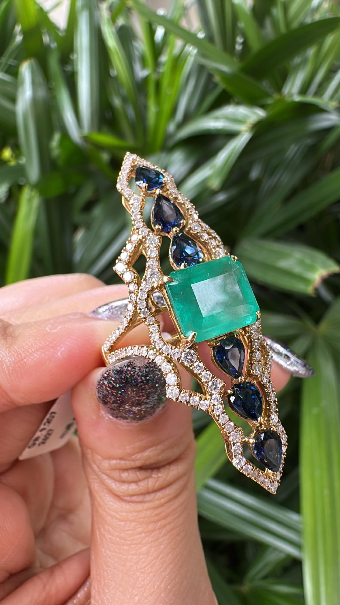Set in 18K Gold, 3.99 carats Emerald, Blue Sapphires & Diamonds Cocktail Ring For Sale 2