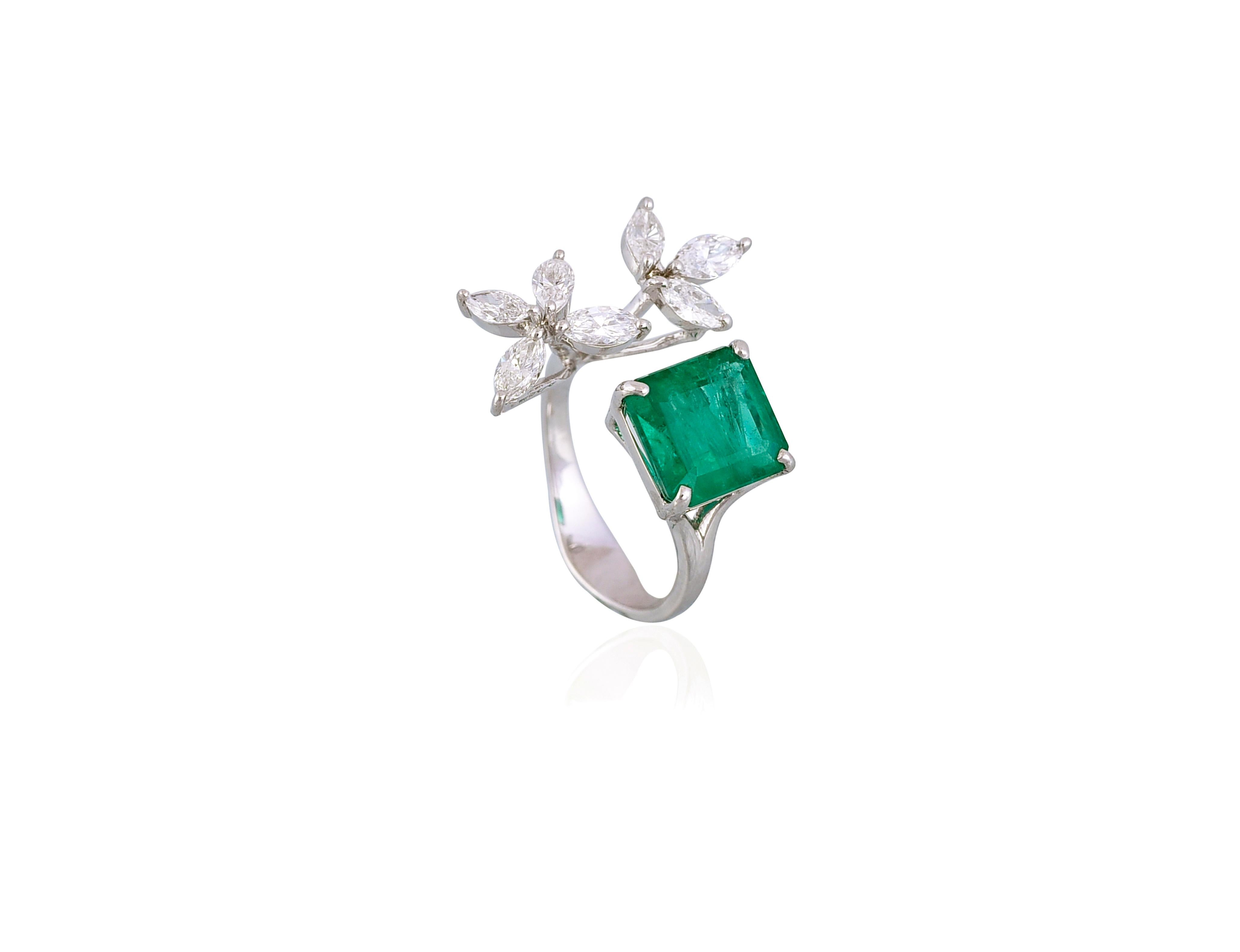 A very chic Emerald & Diamonds Cocktail Ring set in 18K White Gold & Marquise Diamonds. The weight of the Emerald is 4.23 carats. The Emerald originates from Zambia and is completely natural without any treatment. The weight of the diamonds is 1.170