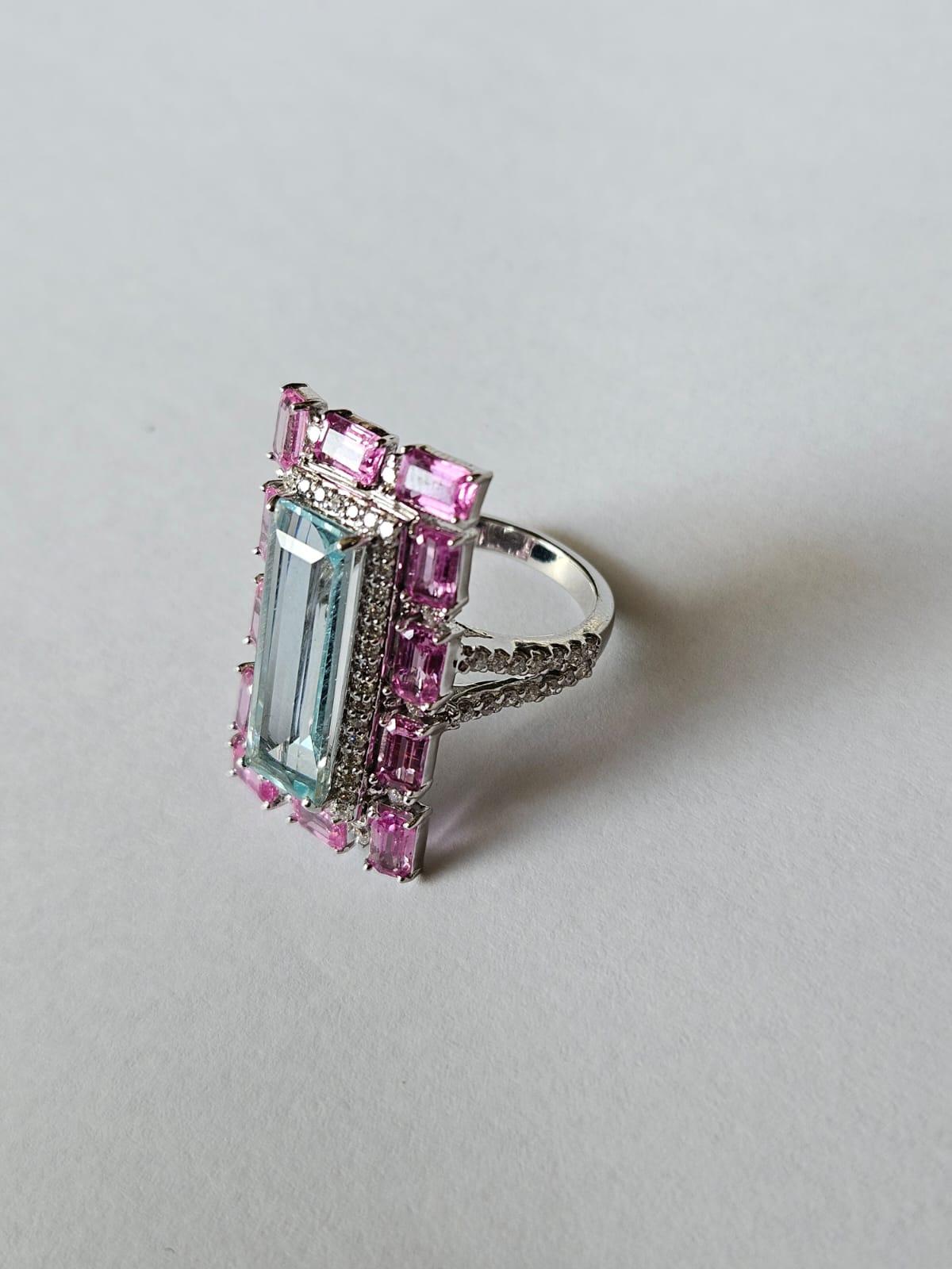 Emerald Cut Set in 18K Gold, 4.33 carats Aquamarine, Pink Sapphires & Diamonds Cocktail Ring