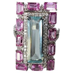 Set in 18K Gold, 4.33 carats Aquamarine, Pink Sapphires & Diamonds Cocktail Ring