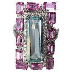 Set in 18K Gold, 4.33 carats Aquamarine, Pink Sapphires 
Diamonds Cocktail Ring
