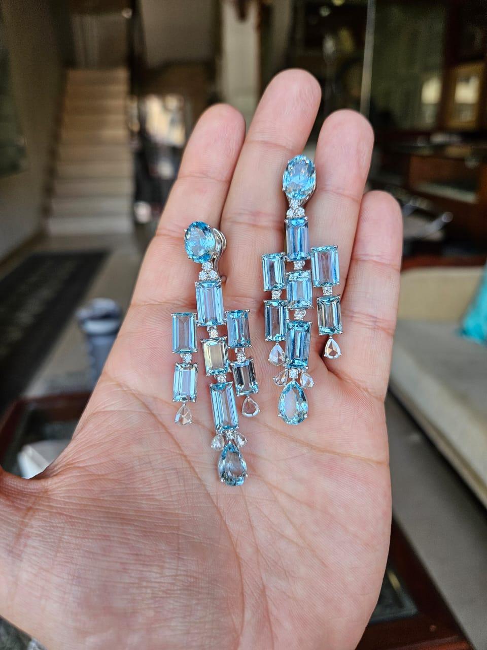 A very gorgeous and beautiful, Aquamarine Chandelier Earrings set in 18K White Gold & natural Diamonds. The weight of the Aquamarines is 43.33 carats. The combined Diamonds weight is 2.65 carats. Net 18K Gold weight is 17.40 grams. The Gross weight