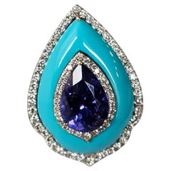 Set in 18K Gold, 4.40 carats, Tanzanite, Turquoise 
Diamonds Cocktail Ring