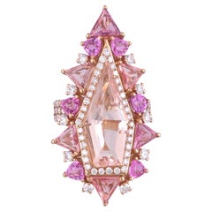 Set in 18K Gold, 4.42 carats Morganite, Multi Sapphires 
Diamonds Cocktail Ring