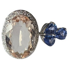 Set in 18K Gold, 4.78 carats Morganite, Blue Sapphires & Diamonds Cocktail Ring