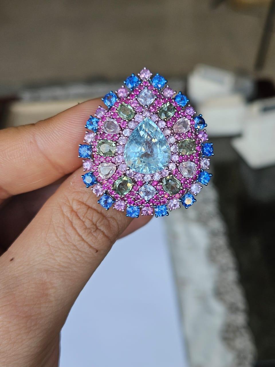 Modern Set in 18K Gold, 4.89 carat Aquamarine, Multi Sapphires & Diamonds Cocktail Ring For Sale
